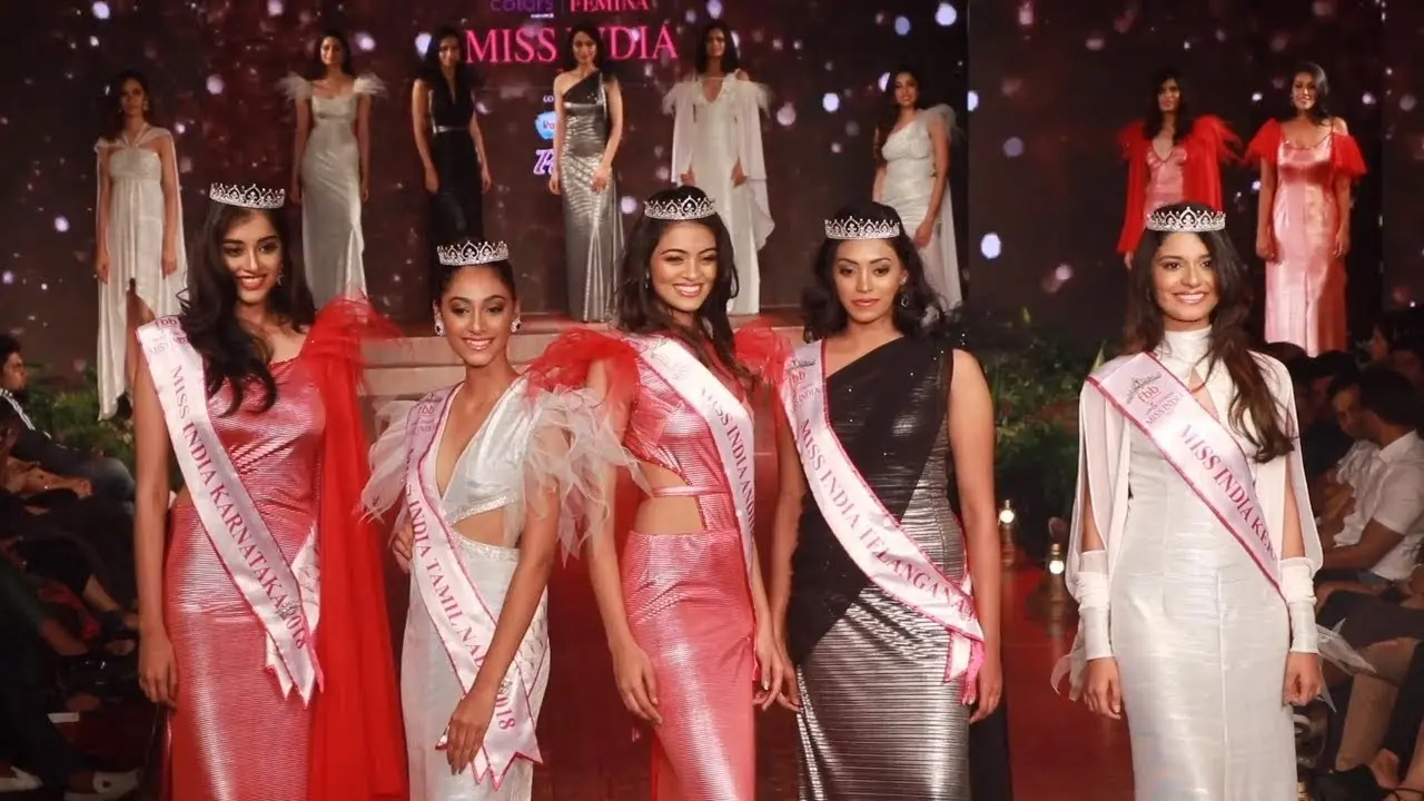Femina Miss India 2018 finalists on stage in sashes and gowns.